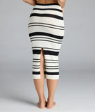 Choosing the black skirt says you’re ready to show off in the Way She Moves Striped Midi Skirt, a warm-weather staple that elevates your outfit and seasonal style.