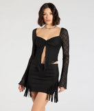 Create bold, fashion-forward looks for spring or summer with the Fringe Attitude Faux Suede Mini Skirt in black, a must-have piece from Windsor’s collection of stylish bottoms for women.