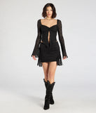 The Fringe Attitude Faux Suede Mini Skirt in black brings edge and energy to your vibe, ready to elevate any festival look or concert outfit.