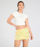Create bold, fashion-forward looks for spring or summer with the Night Moves Sequin Mini Skirt in yellow, a must-have piece from Windsor’s collection of stylish bottoms for women.