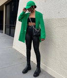 The High-Rise Coated Skinny Pants is a trendy women's bottom in black, designed with modern details and alluring textures to complete chic outfits for 2025.