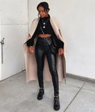 The High-Rise Coated Skinny Pants is a trendy women's bottom in black, designed with modern details and alluring textures to complete chic outfits for 2025.