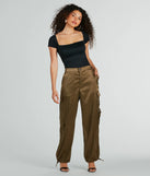 The Sleek Sensation Satin High-Rise Cargo Joggers is a trendy women's bottom in olive green, designed with modern details and alluring textures to complete chic outfits for 2025.