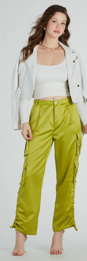 The Trendy Babe Satin Cargo Pants is a trendy women's bottom in lime green, designed with modern details and alluring textures to complete chic outfits for 2025.