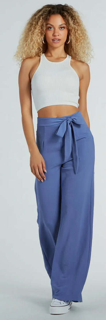 The Sittin Pretty Tie Waist Wide-Leg Palazzo Pants is a pair of stylish women's denim pants, perfect for creating easy winter outfits, from casual days to holiday gatherings.