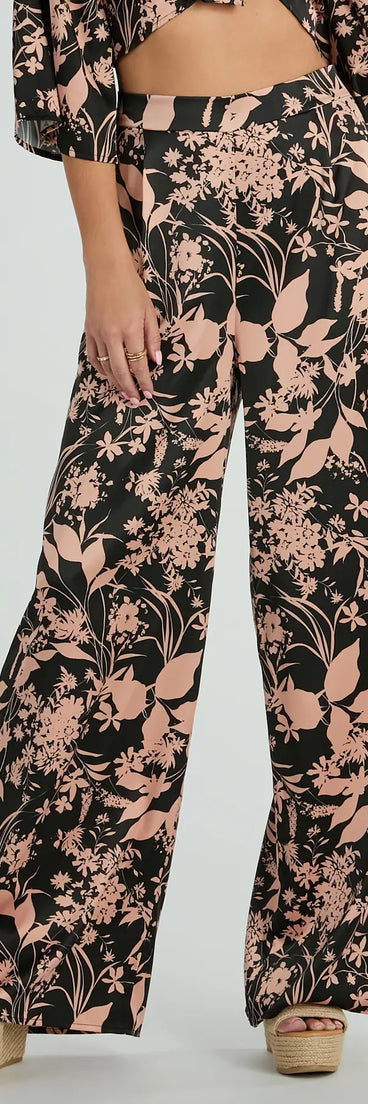 Refresh your fall closet with stylish women's pants like the Flawless Floral High Rise Wide-Leg Satin Pants in a sleek fabric and a pant leg style that makes your look unique.