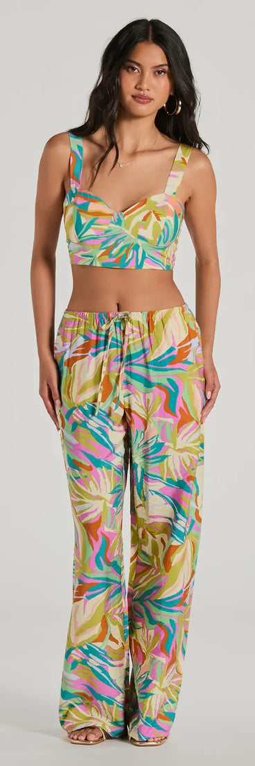 The Getaway Retreat High Rise Tropical Pants in multi-color is a pair of women's pants with an on-trend leg style and elevated fabric that adds texture, perfect for crafting effortless winter outfits.