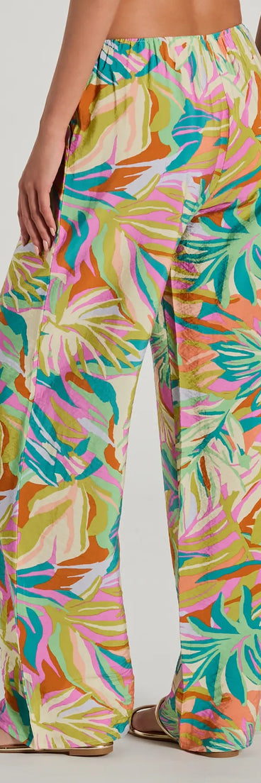 The Getaway Retreat High Rise Tropical Pants in multi-color is a versatile pair of women's pants with trendy design accents, crafted for celebration-ready looks, from office wear to sophisticated winter night outs.