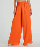 The Gorgeous Allure Chiffon Palazzo Pants in orange is a versatile pair of women's pants with trendy design accents, crafted for holiday-ready looks, from office wear to sophisticated winter night outs.