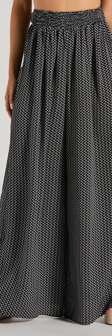 The All Set Up High Rise Geometric Palazzo Pants in black is a versatile pair of women's pants with trendy design accents, crafted for holiday-ready looks, from office wear to sophisticated winter night outs.