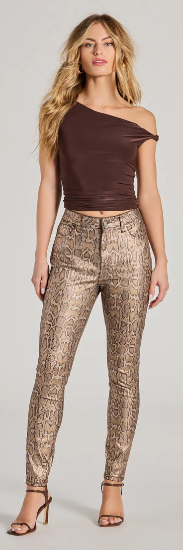 The Major Trend Snake Print Faux Leather Skinny Pants in snake is a pair of women's pants with an on-trend leg style and elevated fabric that adds texture, perfect for crafting effortless winter outfits.