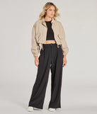 The Posh Play High Rise Wide Leg Trouser Pants in black is a pair of women's pants with an on-trend leg style and elevated fabric that adds texture, perfect for crafting effortless winter outfits.