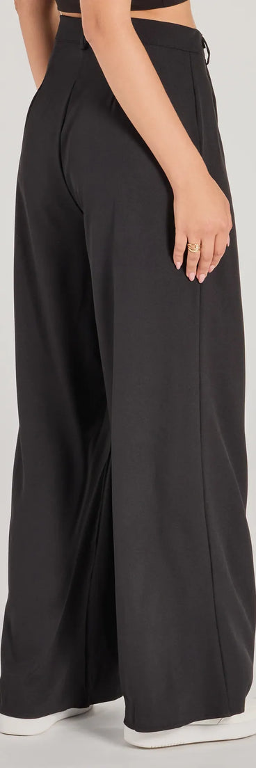 The Posh Play High Rise Wide Leg Trouser Pants in black is a versatile pair of women's pants with trendy design accents, crafted for holiday-ready looks, from office wear to sophisticated winter night outs.