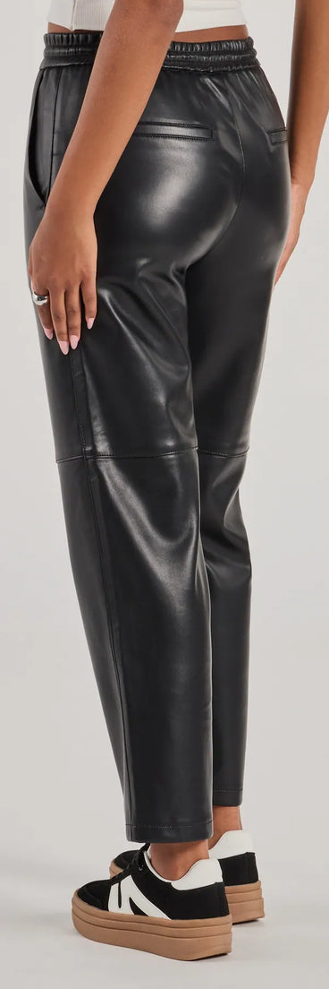 The Rebel Chic Faux Leather Pants is a trendy women's bottom in black, designed with modern details and alluring textures to complete chic outfits for 2025.