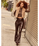 The Trendsetter Alert Coated Faux Leather Flared Pants in brown is a women's workwear piece offering a trendy style and unique accents, perfect for effortlessly creating an outfit-of-the-day look that transitions your office look to going-out ready.