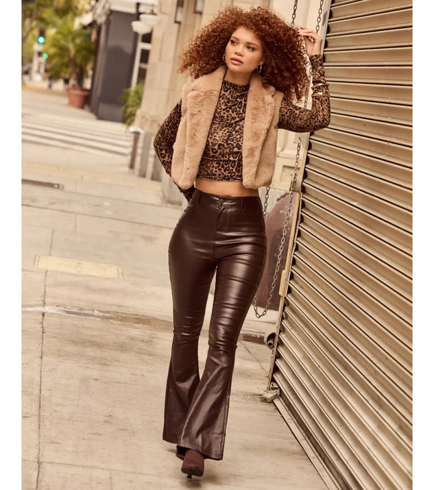 The Trendsetter Alert Coated Faux Leather Flared Pants in brown is a women's workwear piece offering a trendy style and unique accents, perfect for effortlessly creating an outfit-of-the-day look that transitions your office look to going-out ready.