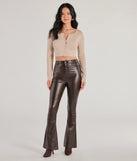 The Trendsetter Alert Coated Faux Leather Flared Pants is a trendy women's bottom in brown, designed with modern details and alluring textures to complete chic outfits for 2025.