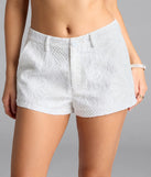 Choosing the ivory shorts says you’re ready to show off in the Chic Babe Eyelet Lace Shorts, a warm-weather staple that elevates your outfit and seasonal style.