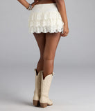 The Cutesy Perfection Ruffled Lace Mini Skort in off-white features a short, flattering cut designed to elevate your look with just the right amount of edge.