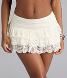With a flirty cut and hidden shorts underneath, the Cutesy Perfection Ruffled Lace Mini Skort in ivory serves skirt vibes with zero wardrobe worries.