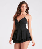 Perfect as a dress alternative for a date-night outfit, wedding guest attire, and cocktail party dress alike, the Flirty Lace Back Skater Romper is a women's black romper that combines a stylish, unique design with festive colors and on-trend details for a standout look!
