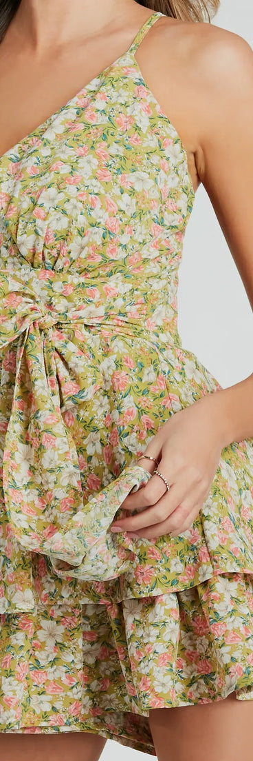 Perfect as a dress alternative for a New Year's outfit, wedding guest attire, and cocktail party dress alike, the In My Element V-Neck Bow Ruffled Floral Romper is a women's sage romper that combines a stylish, unique design with festive colors and holiday-ready details for a standout look!