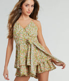 Perfect as a dress alternative for a New Year's outfit, wedding guest attire, and cocktail party dress alike, the In My Element V-Neck Bow Ruffled Floral Romper is a women's sage romper that combines a stylish, unique design with festive colors and holiday-ready details for a standout look!