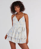 Perfect as a dress alternative for a New Year's outfit, wedding guest attire, and cocktail party dress alike, the Sweet Romance Tie-Front Floral Woven Skater Romper is a women's ivory romper that combines a stylish, unique design with festive colors and holiday-ready details for a standout look!