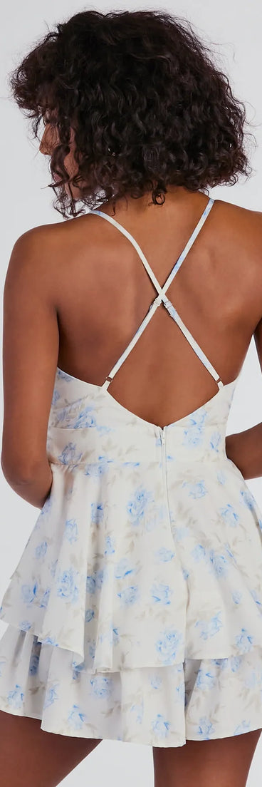 Perfect as a dress alternative for a New Year's outfit, wedding guest attire, and cocktail party dress alike, the Sweet Romance Tie-Front Floral Woven Skater Romper is a women's ivory romper that combines a stylish, unique design with festive colors and holiday-ready details for a standout look!