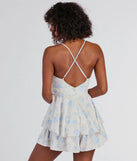 Perfect as a dress alternative for a New Year's outfit, wedding guest attire, and cocktail party dress alike, the Sweet Romance Tie-Front Floral Woven Skater Romper is a women's ivory romper that combines a stylish, unique design with festive colors and holiday-ready details for a standout look!