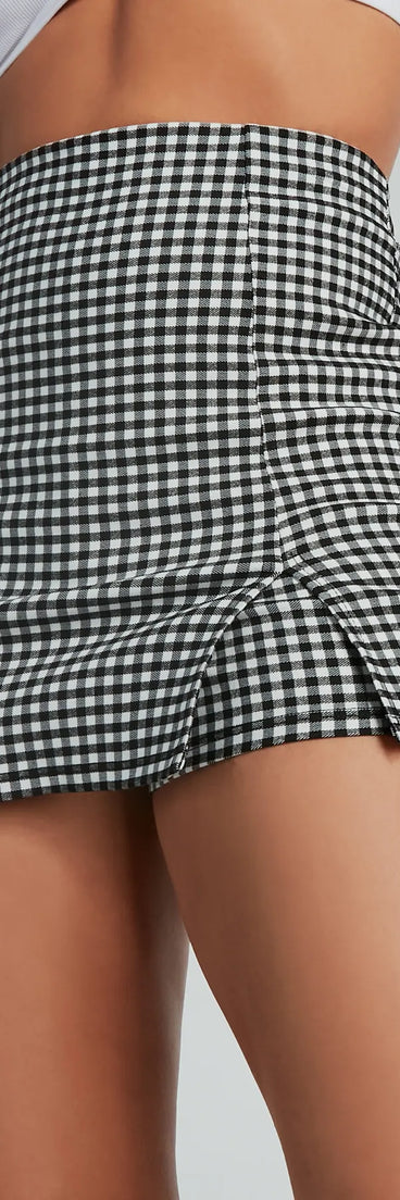 The Girl Next Door Gingham Print Mini Skort offers a discreetly comfy fit with shorts under a stylish skirt overlay featuring the latest accents and details.
