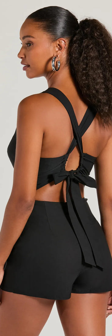 The Fresh Summer Vibes Wrap-Front Romper is a trendy women's bottom in black, designed with modern details and alluring textures to complete chic outfits for 2025.