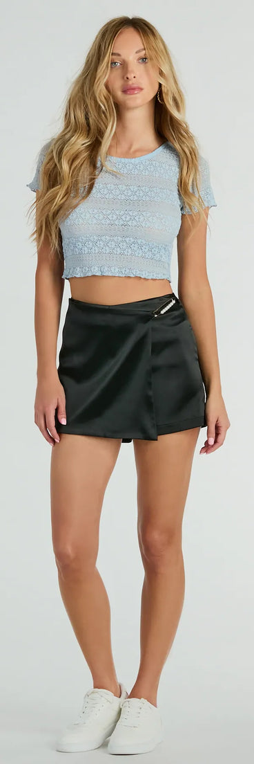 The Perfect Polished Faux Pearl Pin Mini Satin Skort in black brings edge and energy to your vibe, ready to elevate any festival look or concert outfit.