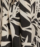 Perfect as a dress alternative for a New Year's outfit, wedding guest attire, and cocktail party dress alike, the Exotic Vibes Strapless Tie-Front Tropical Romper is a women's black romper that combines a stylish, unique design with festive colors and holiday-ready details for a standout look!