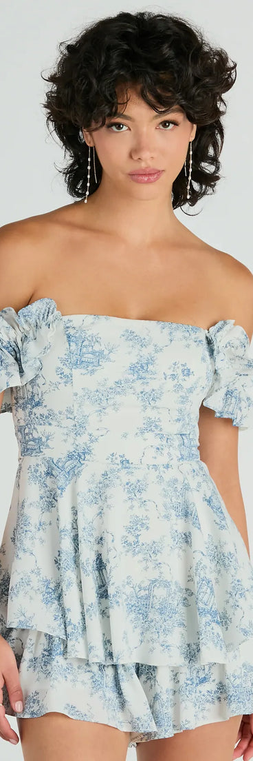 The Pretty Girl Ruffled Off-The-Shoulder Scenic Print Romper is an elevated one-piece that blends sleek sophistication with playful charm, perfect for nailing casual or formal outfits.