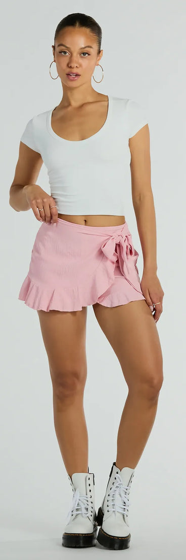 The Days For Play High-Rise Ruffle Mini Skort offers a discreetly comfy fit with shorts under a stylish skirt overlay featuring the latest accents and details.