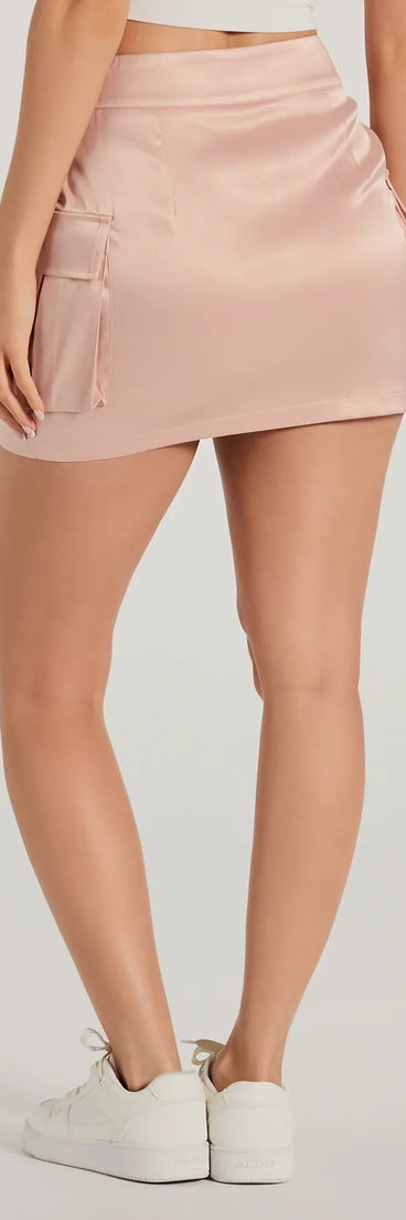 The Stylish Occasion Satin Cargo Mini Skirt is a trendy women's bottom in pink, designed with modern details and alluring textures to complete chic outfits for 2025.