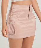 Choosing the pink skirt says you’re ready to show off in the Stylish Occasion Satin Cargo Mini Skirt, a warm-weather staple that elevates your outfit and seasonal style.