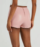 Get the look of a skirt and the comfort of shorts in the Worth It Faux Leather Mini Skort in pink, perfect for staying stylish while on the move this summer.