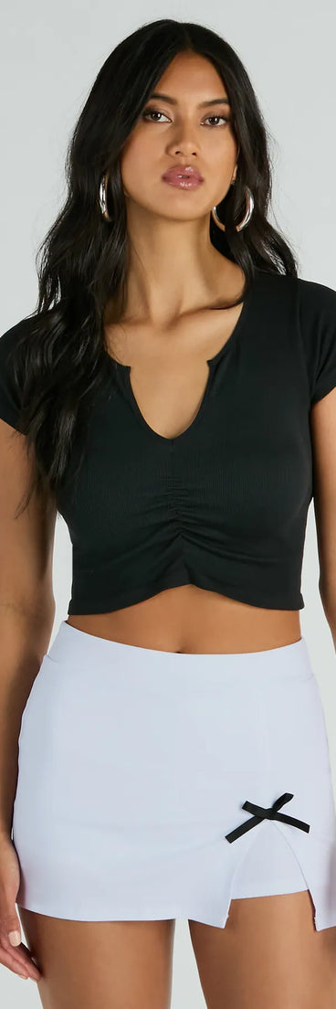 The Ultra Cute Icon High-Rise Side Bow Mini Skort in white brings edge and energy to your vibe, ready to elevate any festival look or concert outfit.