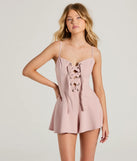 Perfect as a dress alternative for a New Year's outfit, wedding guest attire, and cocktail party dress alike, the Irresistible Cutie Lace-Up Skater Romper is a women's mauve romper that combines a stylish, unique design with festive colors and holiday-ready details for a standout look!