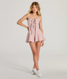 Perfect as a dress alternative for a New Year's outfit, wedding guest attire, and cocktail party dress alike, the Irresistible Cutie Lace-Up Skater Romper is a women's mauve romper that combines a stylish, unique design with festive colors and holiday-ready details for a standout look!