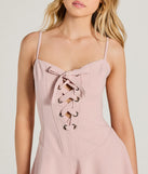 Perfect as a dress alternative for a New Year's outfit, wedding guest attire, and cocktail party dress alike, the Irresistible Cutie Lace-Up Skater Romper is a women's mauve romper that combines a stylish, unique design with festive colors and holiday-ready details for a standout look!