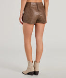 The Chic Factor Wrap-Front Faux Leather Skort is a trendy women's bottom in brown, designed with modern details and alluring textures to complete chic outfits for 2025.