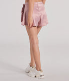 The Releve Cutie Faux Wrap Satin Skater Skirt is a trendy women's bottom in mauve, designed with modern details and alluring textures to complete chic outfits for 2025.