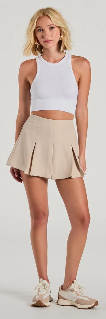 The Truly Chic High-Rise Pleated Mini Skort offers a discreetly comfy fit with shorts under a stylish skirt overlay featuring the latest accents and details.