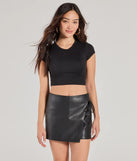 Create bold, fashion-forward looks for summer with the Sleek Moment Tie-Waist Faux Leather Skort in black, a must-have piece from Windsor’s collection of stylish bottoms for women.