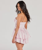 The Gorgeous Stance Strapless Corset Floral Satin Romper is a blush dress, an essential holiday or NYE dress that pairs chic style with versatility making it perfect for cocktail events, New Year's Eve parties, or as a winter wedding guest look.