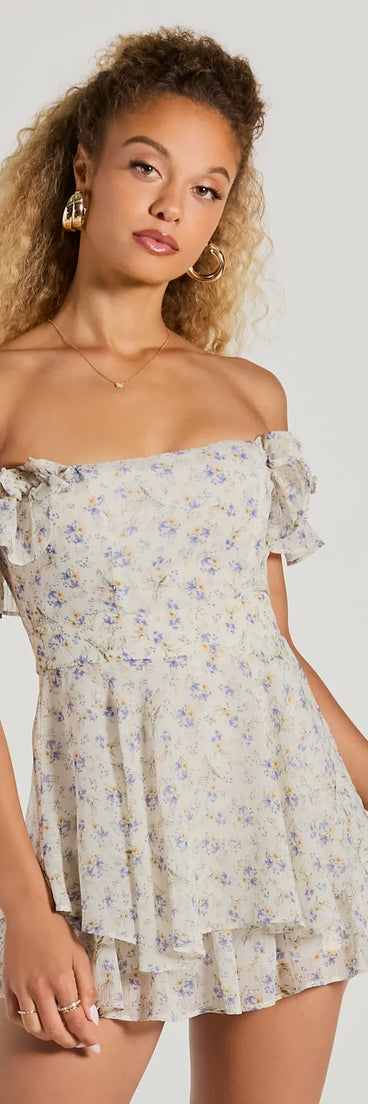 The Fun And Flirty Off-The-Shoulder Ruffled Floral Romper is an elevated one-piece that blends sleek sophistication with playful charm, perfect for nailing casual or formal outfits.