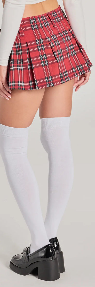 The Sassy Vibe Belted Plaid Micro Skort is a trendy women's bottom in red, designed with modern details and alluring textures to complete chic outfits for 2025.